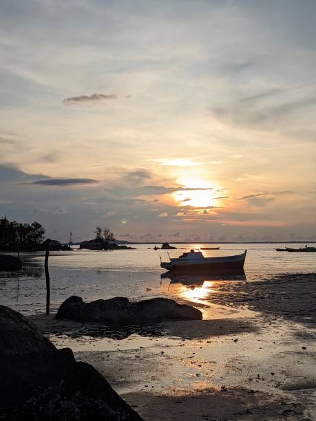 istock beautiful sunset view on Putat beach - Bangka Belitung Island 1485740727