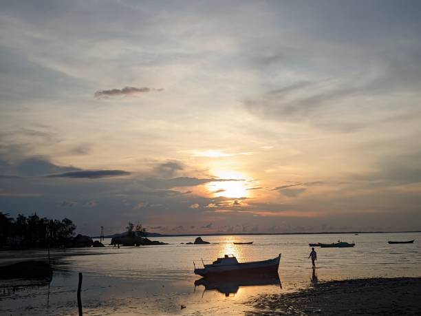 istock beautiful sunset view on Putat beach - Bangka Belitung Island 1485740813
