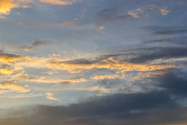 istock clouds in the sky illuminated by the sun summer evening. background 1485742187
