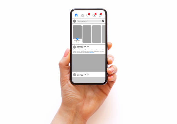 Phone in hand with social media app mockup on it's screen