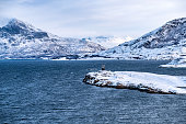 Snowcapped Mountain Range In The Norwegian Sea, Nordland, Norway