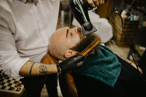 istock Getting a stylish beard at the barber shop 1485755459