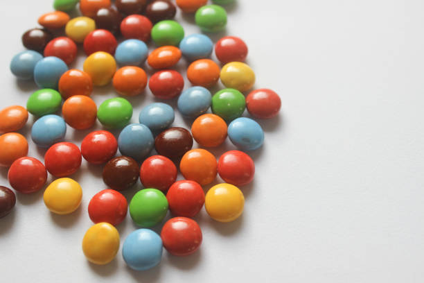 Colorful chocolate candies that look delicious on a white background