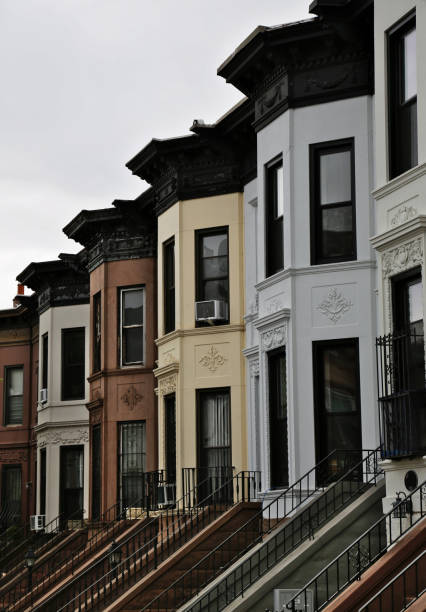 istock colorful row houses in brooklyn, new york (brownstones) 1485765663