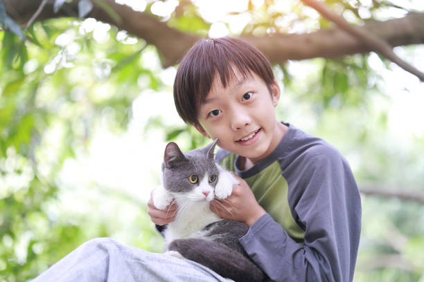 istock Little boy and his cat 1485766513