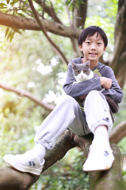 istock Little boy and his cat 1485766524