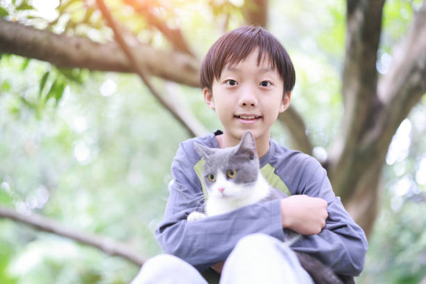 istock Little boy and his cat 1485766545