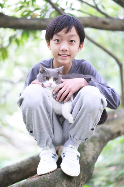 istock Little boy and his cat 1485766550