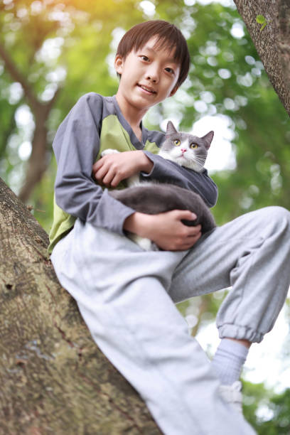 istock Little boy and his cat 1485766609