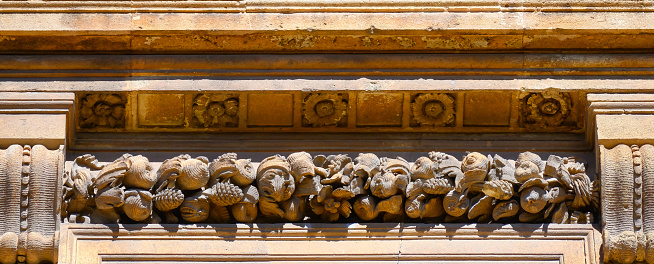 Facade of building in the historic city center of Mantua. Italy
