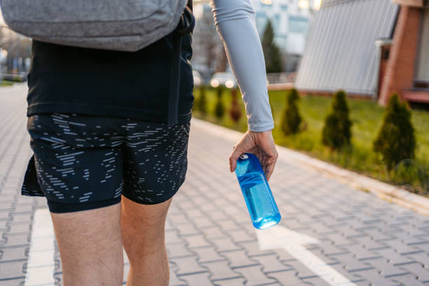 istock Young Man With A Backpack Walking Home After A Workout 1485778808