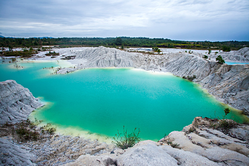 Exotica of Blue and Green Kaolin Lake in Bangka, Bangka Belitung, Indonesia. This lake is a former tin mining excavation area which is widely found on Bangka Island.