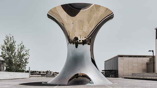 Jerusalem, Israel - April 25th, 2019 : Israel Museum Polished Steel Hourglass Sculpture at the Entrance of the Israel Museum. Founded in 1965, the museum has a wide collection of objects around the Israel Museum. Jerusalem, Israel, Middle East