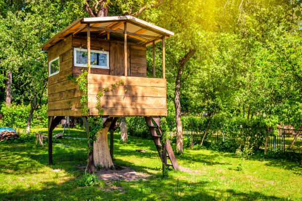 istock Handmade tree house in sunny garden 1485793172