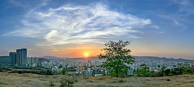 Panorama image of Beautiful evening sky during Sunset in the Pune city.