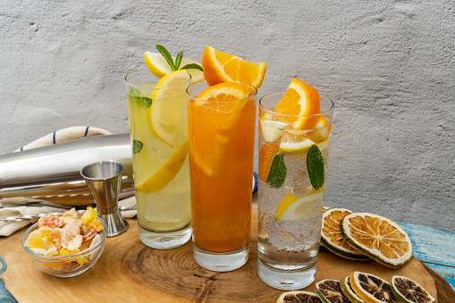 Orange juice and lemonade with dry lemon and orange slices.