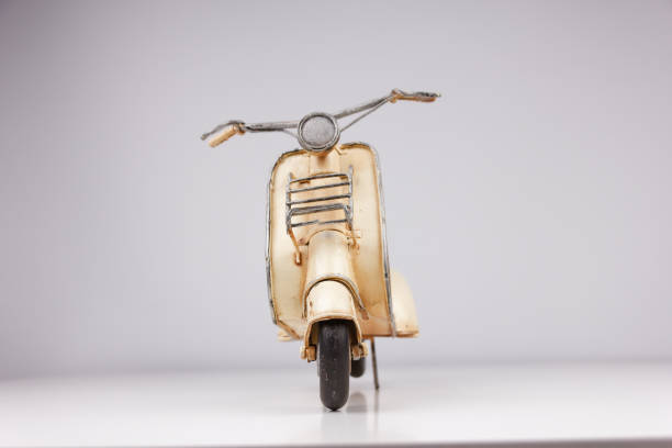 istock detailed view of motor scooter model on white table 1485798436