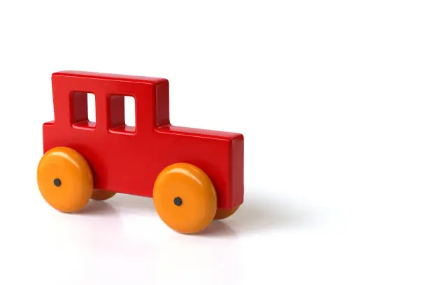 Photo of Vintage Red Toy Car, Isolated on White Background