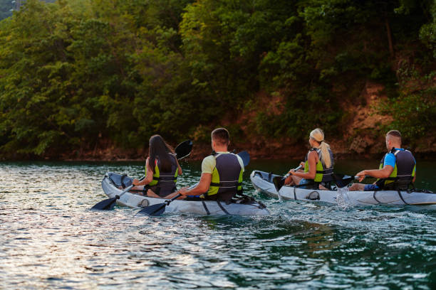 istock A group of friends enjoying having fun and kayaking while exploring the calm river, surrounding forest and large natural river canyons 1485800845