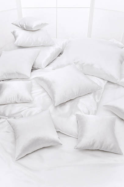 istock Heap of pillows at a window 148580160