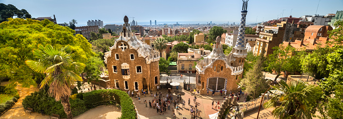 The stunningly vibrant colours and twisting shapes of the Spanish architect Gaudi's famous Parc Guell in Barcelona, Spain.
