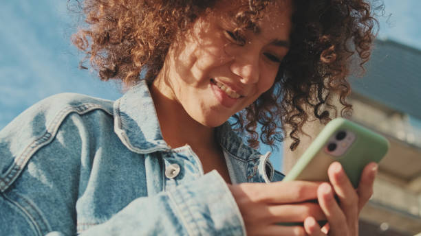istock Close-up of young woman's hands using mobile phone 1485809575