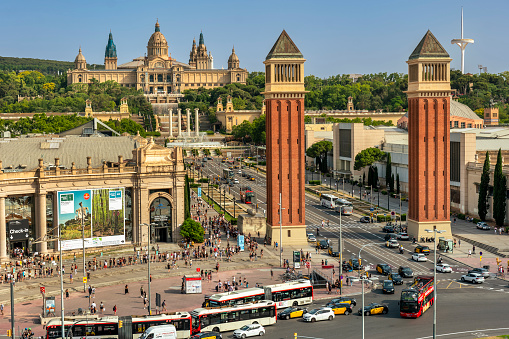 Barcelona, Spain - June 17, 2022: View of the Plaça d'Espanya and Palau Nacional or Montjuïc National Palace Art Museum of Catalonia in Barcelona Spain who is the main site of the 1929 International Exhibition