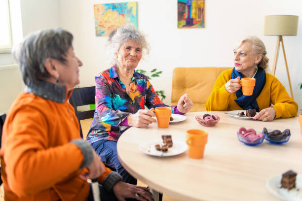 istock Three retired female friends drinking afternoon tea 1485815949