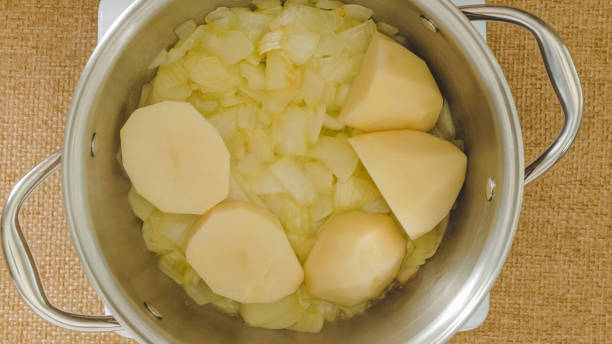 istock Raw vegetables slices in a cooking pan. Vegetable soup recipe, flat lay 1485819840