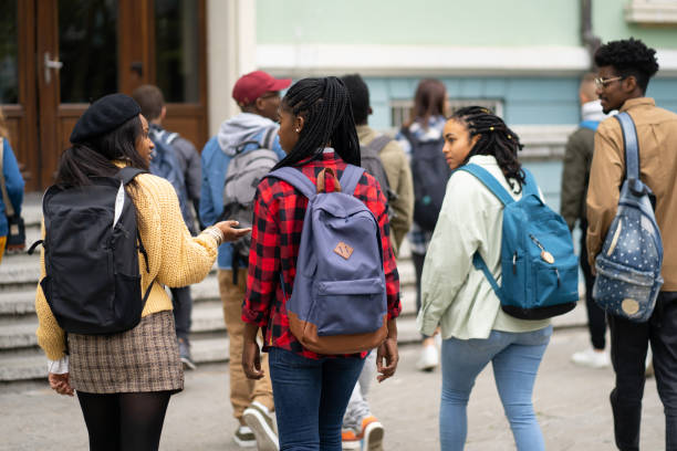 istock Multiethnic students going to the University together having a conversation 1485820535