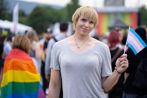 Transgender person attending a parade in support of diversity, equality and human rights and against any form of discrimination. Happy Pride Month.