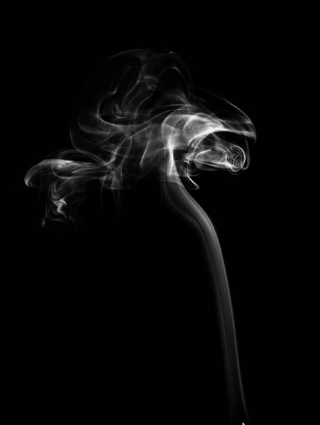 istock A jet of white smoke on a black background 1485822799
