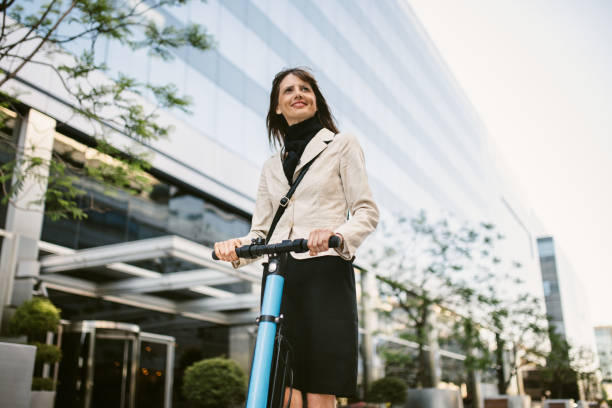 istock Businesswoman Commuting on Electric Scooter 1485822822