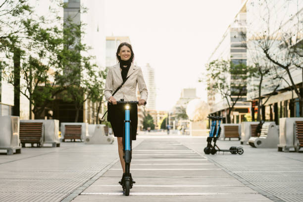 istock Businesswoman Commuting on Electric Scooter 1485822823