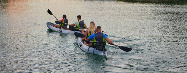 istock A group of friends enjoying having fun and kayaking while exploring the calm river, surrounding forest and large natural river canyons 1485823772