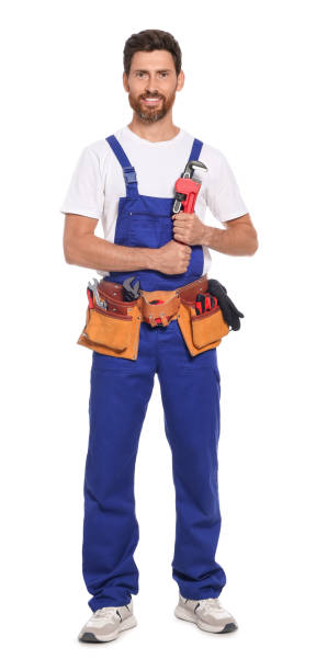 istock Professional plumber with pipe wrench and tool belt on white background 1485823857