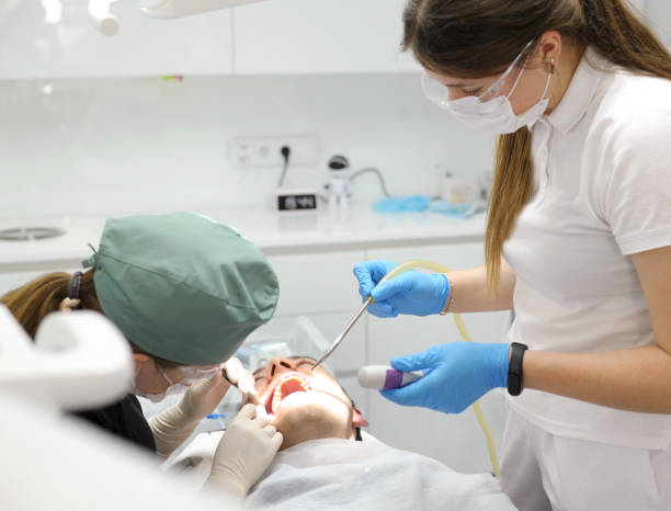 istock instruments surgery dentistry clinic dental office, a dentist and his assistant perform an operation to remove high wisdom teeth. The concept of surgery in dentistry 1485825046