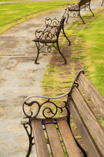 istock Some wooden benches in a square. 1485825627