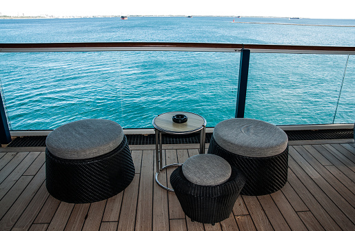 Chairs and table on cruise ship open deck