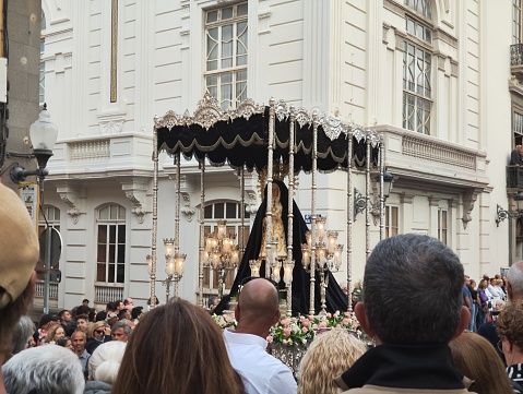 Las Palmas de Gran Canaria, April 4th: people are gathered in s Catholic procession with the Virgen Mary sculpture