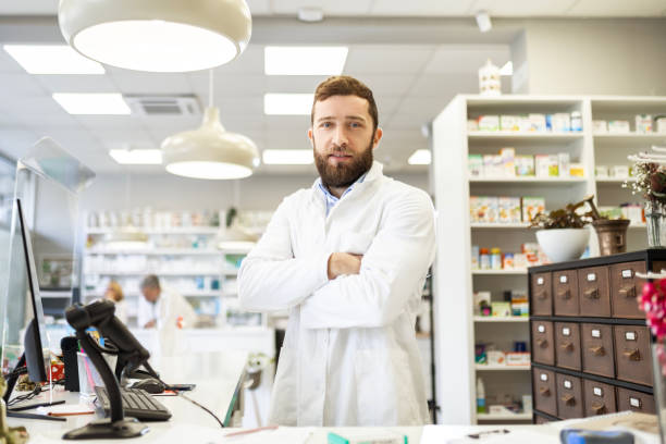 istock Young Man Pharmacist with arms crossed looking at camera 1485832944