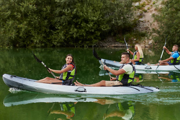 istock A group of friends enjoying having fun and kayaking while exploring the calm river, surrounding forest and large natural river canyons 1485833264