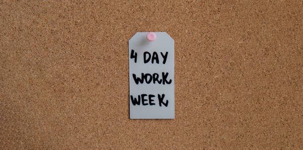 istock 4 day work week text on paper note pinned to desk four day working week concept. Modern approach doing business short workweek. Effectiveness of employees. Productivity and efficiency 1485837573
