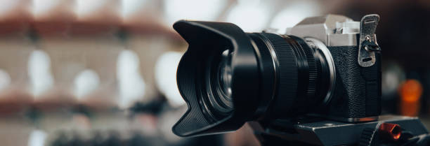 istock professional photo camera in street 1485850974