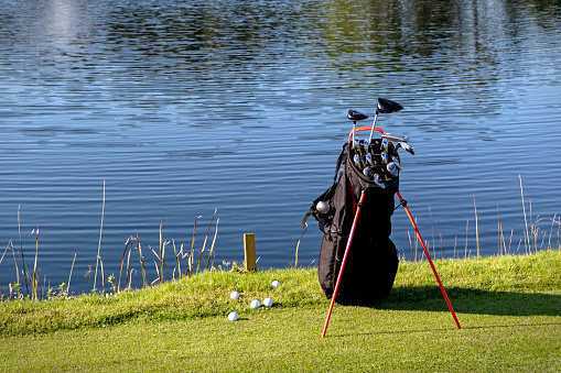 Golf bag in a golf course. Sport Equipment.