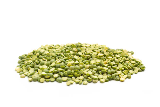 istock A heap of green lentils on a white background with copy space 1485852569