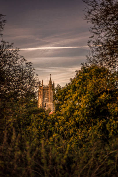 istock View of church between trees. 1485868967