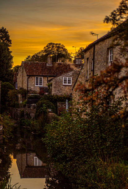 istock Sunset over settlement.English village. 1485869114
