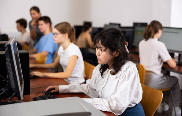 istock Teenage girl using computer during lesson 1485869684