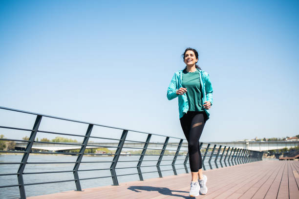 istock Woman spends time outside maintaining good form 1485869835